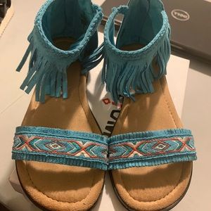 Minnetonka festival like moccasin sandals.